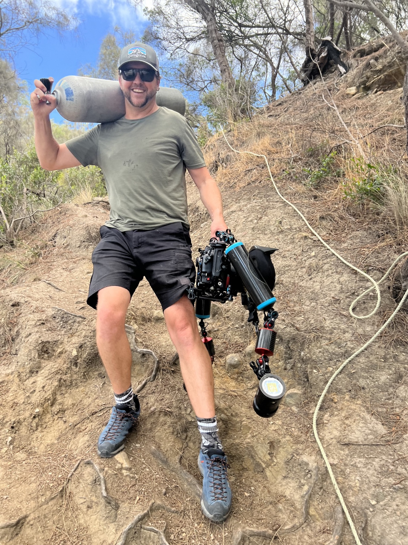 Carrying filming equipment through the field