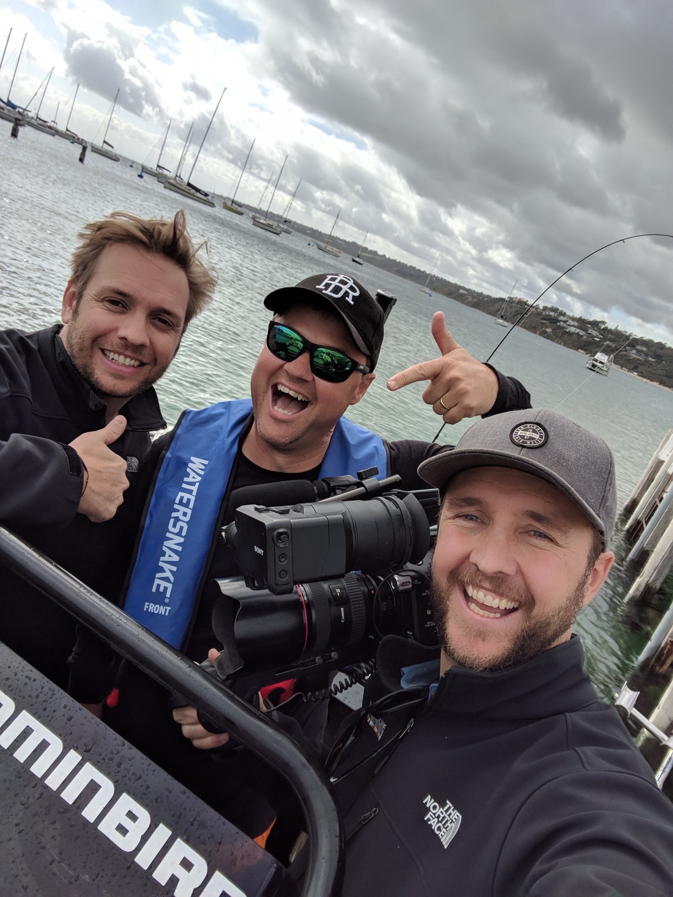 The filming team together on the water